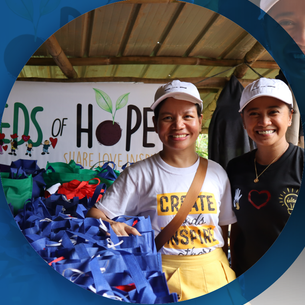 Seeds of Hope volunteers with school supplies for the community